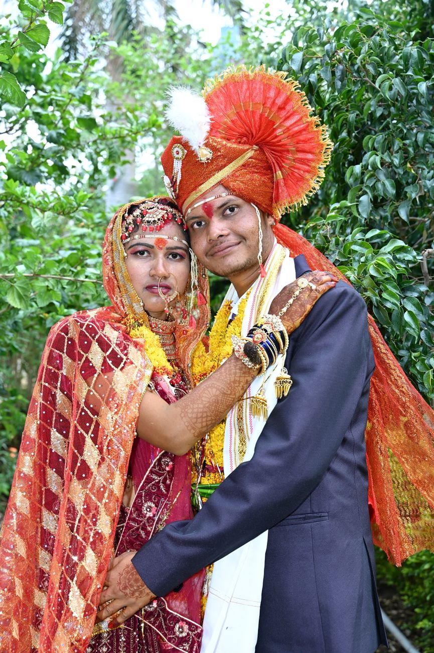 Divya and Kabir in traditional wedding attire
